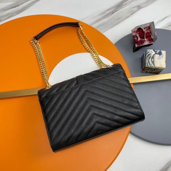 YSL ENVELOPE IN QUILTED GRAIN DE POUDRE EMBOSSED LEATHER BAG