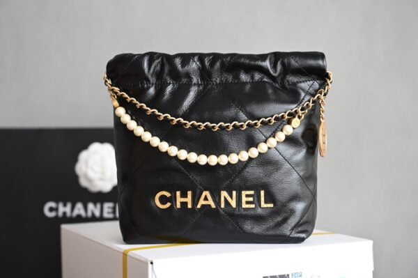 CHANEL 22 MINI HANDBAG Shiny Calfskin & Gold-Tone Metal Pearl chain