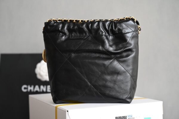 CHANEL 22 MINI HANDBAG Shiny Calfskin & Gold-Tone Metal Pearl chain