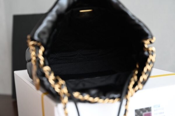 CHANEL 22 MINI HANDBAG Shiny Calfskin & Gold-Tone Metal Pearl chain