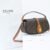 CELINE CLUTCH ON STRAP TABOU IN TRIOMPHE CANVAS AND CALFSKIN - TAN