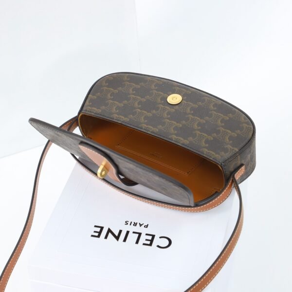 CELINE CLUTCH ON STRAP TABOU IN TRIOMPHE CANVAS AND CALFSKIN - TAN