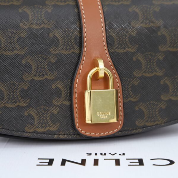 CELINE CLUTCH ON STRAP TABOU IN TRIOMPHE CANVAS AND CALFSKIN - TAN