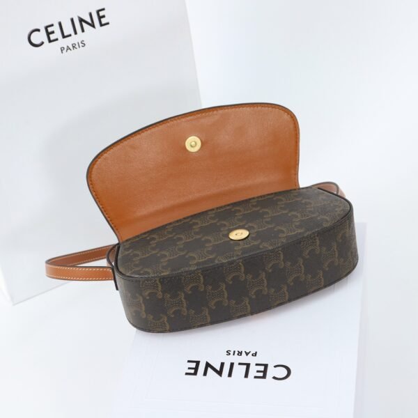 CELINE CLUTCH ON STRAP TABOU IN TRIOMPHE CANVAS AND CALFSKIN - TAN