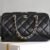 Chanel AP4474 (9) CHANEL Classic chain bag Shiny grained calfskin and gold-tone metal Bowling Bag Black