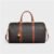 MEDIUM TRAVEL BAG IN TRIOMPHE CANVAS AND CALFSKIN