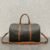 MEDIUM TRAVEL BAG IN TRIOMPHE CANVAS AND CALFSKIN
