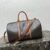 190672CAS (3) LARGE TRAVEL BAG IN TRIOMPHE CANVAS AND CALFSKIN