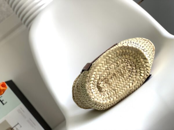 327.02 (3) Small Basket bag in palm leaf and calfskin