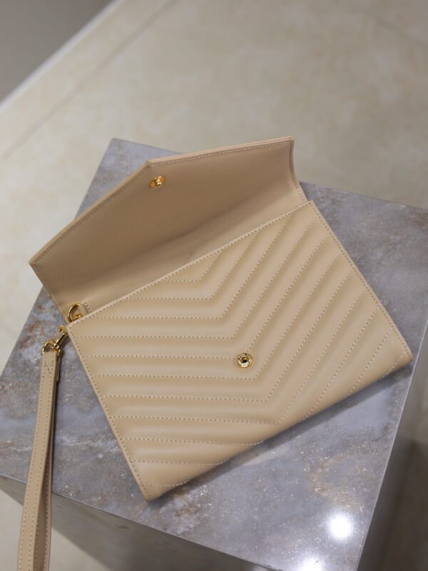 CASSANDRE MATELASSÉ FLAP POUCH IN GRAIN DE POUDRE LEATHER