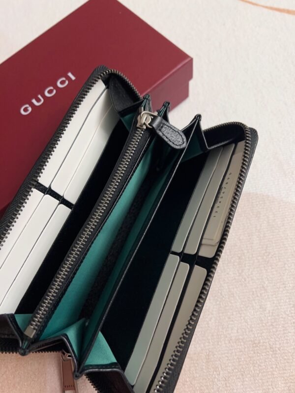 834694 AAE1A 1042 (1) OPHIDIA ZIP AROUND WALLET