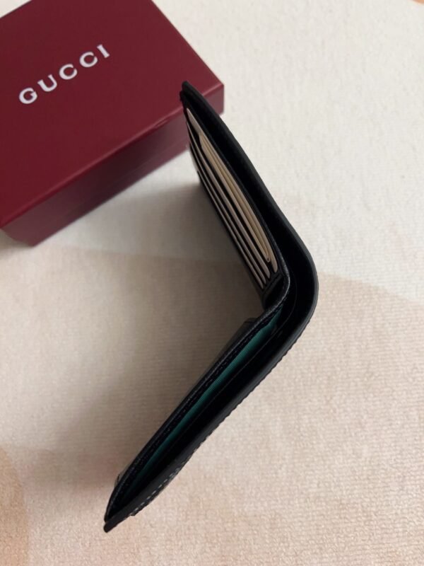 834792 AAE1A 1042 (1) OPHIDIA COIN WALLET