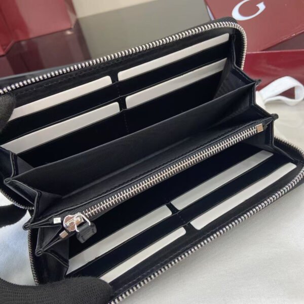 GUCCI IMPRINT ZIP AROUND WALLET