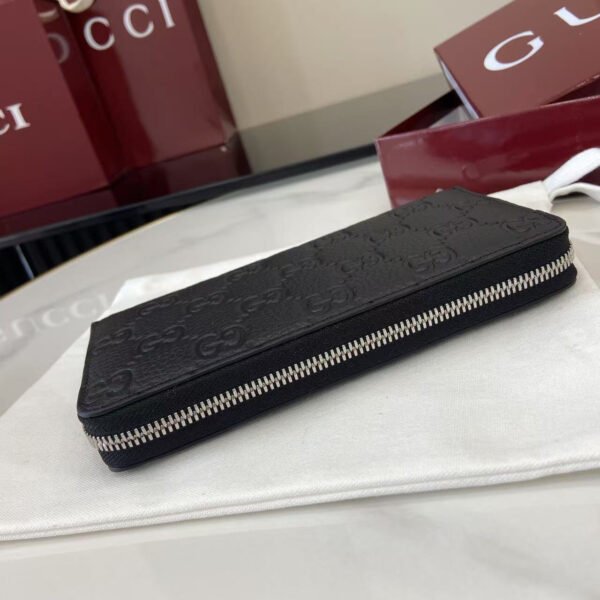 GUCCI IMPRINT ZIP AROUND WALLET
