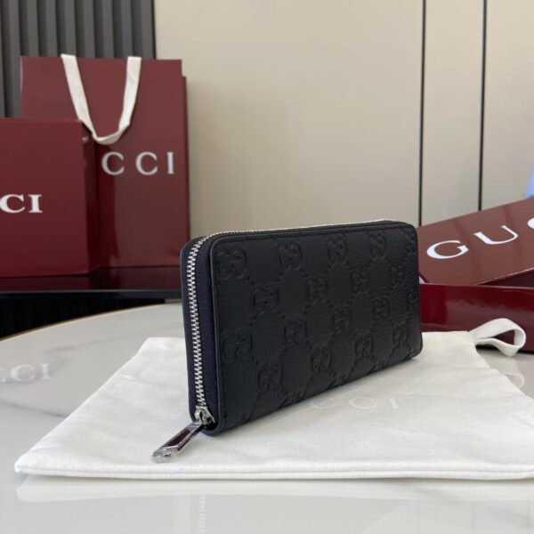 GUCCI IMPRINT ZIP AROUND WALLET