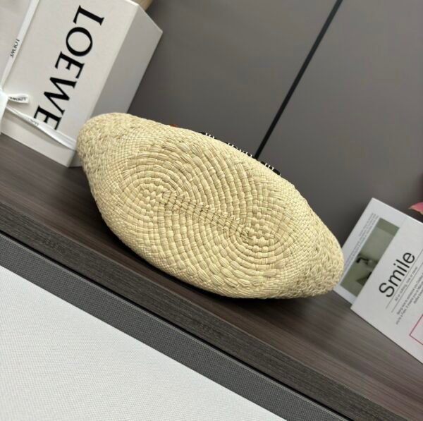 Small Anagram Basket bag in iraca palm and calfskin