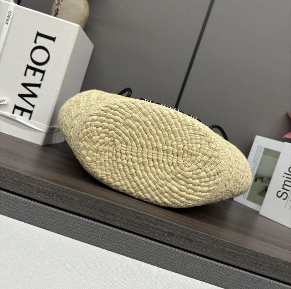 Small Anagram Basket bag in iraca palm and calfskin