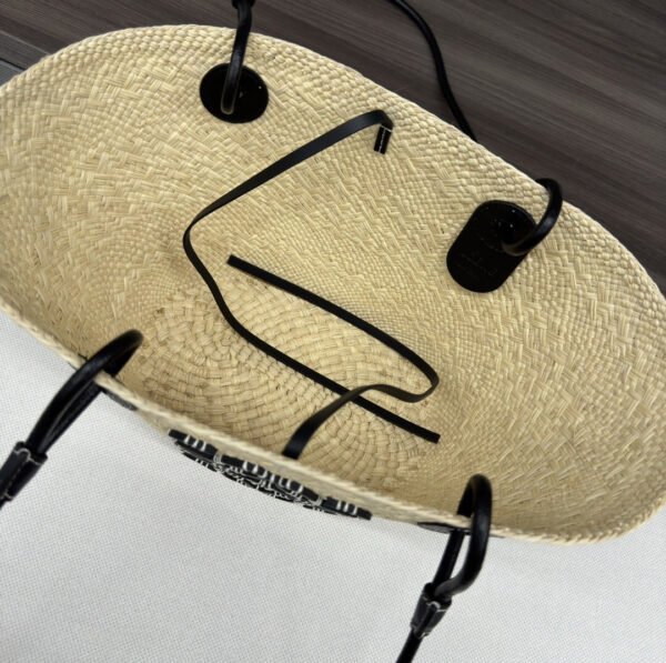 Small Anagram Basket bag in iraca palm and calfskin