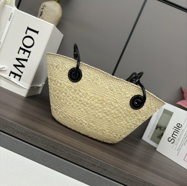 Small Anagram Basket bag in iraca palm and calfskin