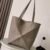 Medium Puzzle Fold tote in soft grained calfskin