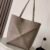 Medium Puzzle Fold tote in soft grained calfskin