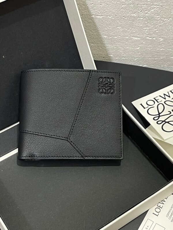 Puzzle bifold wallet in classic calfskin