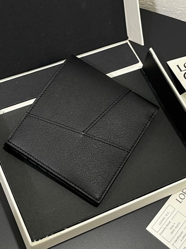 Puzzle bifold wallet in classic calfskin