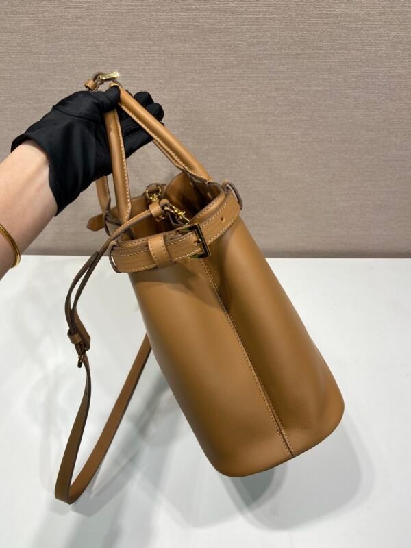 1BA417_2CYS (1) Prada Buckle medium leather handbag with double belt