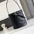 Prada Buckle leather bucket bag with belt