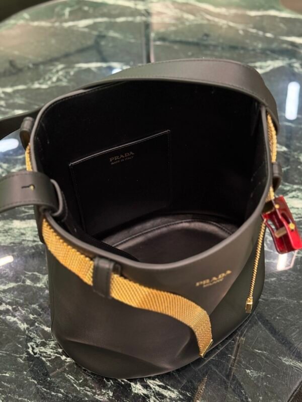 Prada Buckle leather bucket bag with jeweled belt